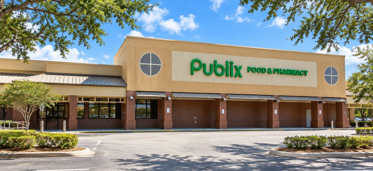 Sunny Publix Storefront and Empty Parking Lot